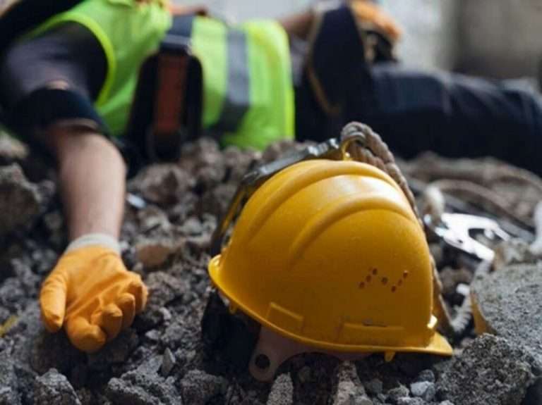 Yelllow hard hat on the ground