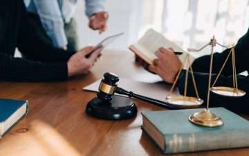 Lawyer and clients at a table