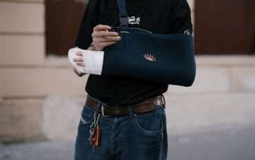 A person with a cast on his arm