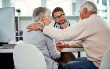 lawyer with elderly couple
