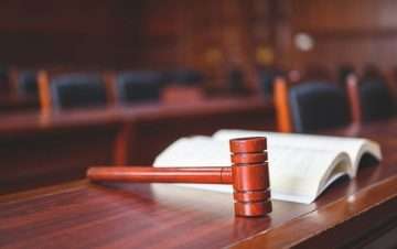 Gavel and book on a desk