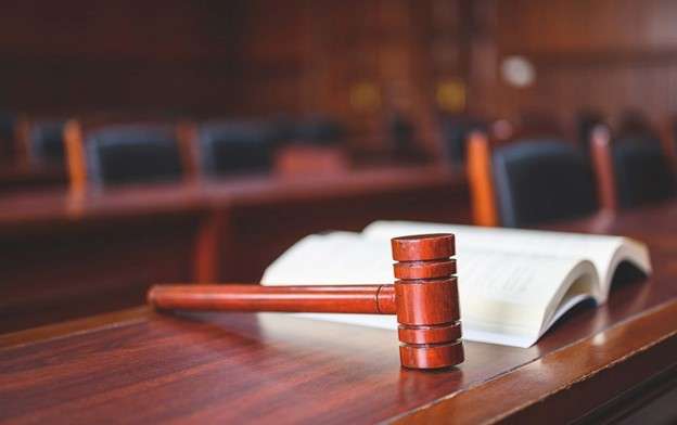Gavel and book on a desk