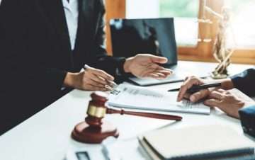 meeting with lawyer around a desk
