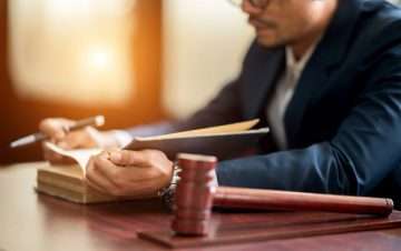 lawyer at a table with a gavel