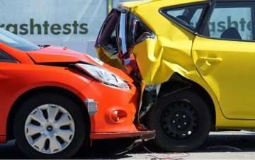 Red car in rear-end collision with yellow car. Who is responsible for rear-end collisions?