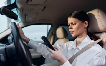 Female distracted driver on phone